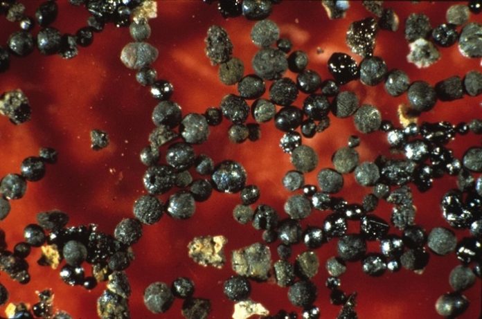 Tiny, ancient meteorites suggest early Earth’s atmosphere was rich in carbon dioxide
