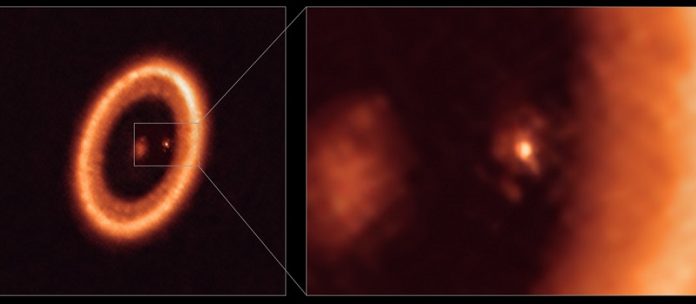 Wide and close-up views of a moon-forming disc as seen with ALMA