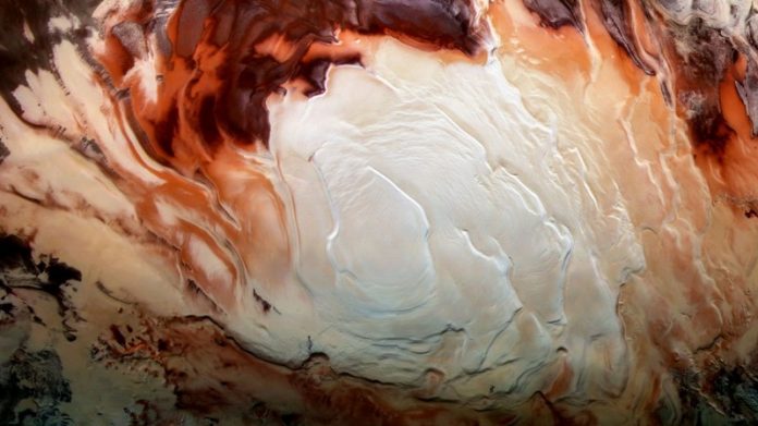 Mars’ bright south pole reflections may be clay, not water, shows study