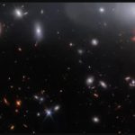 Astronomers find a remarkably small and distant galaxy