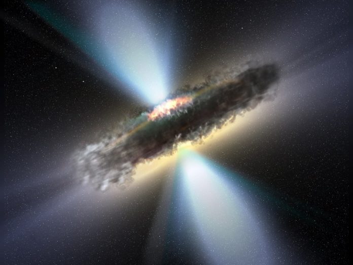 Giant black holes play peekaboo in dusty galaxies