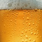 Why the bubbles in Belgian beers refuse to pop