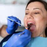 Treating gum disease may lower risk of heart attacks and strokes