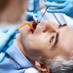 Men and women may have different bone loss in gum disease